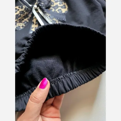 ست لباس دخترانه طرح پلنگی دورس دو نخ سایز 4 تا 12 سال گزینه ها ۵۰