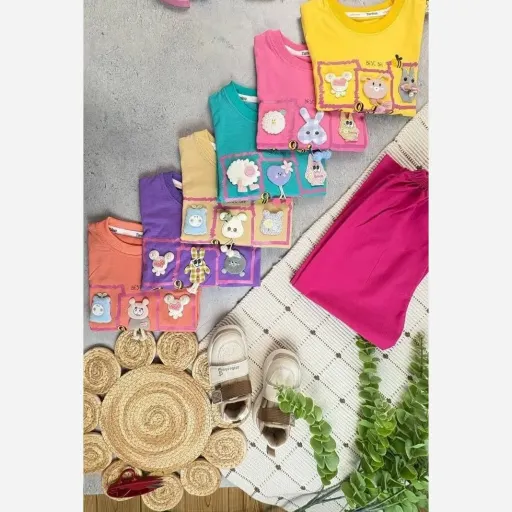 بلوز و شلوار دخترانه طرح برجسته عروسکی رنگ کرمی 55