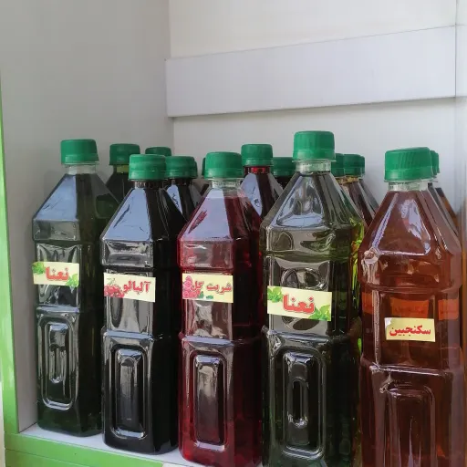 شربت گل محمدی دست ساز کاملا طبیعی و بدون افزودنی یک کیلو و صد گرمی