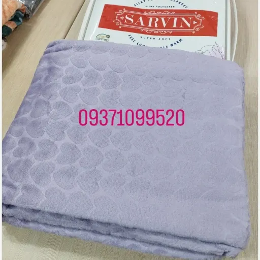 پتو نرمینه یکنفره مدل سروین مسافرتی ساکدار براق و لطیف رنگ یاسی