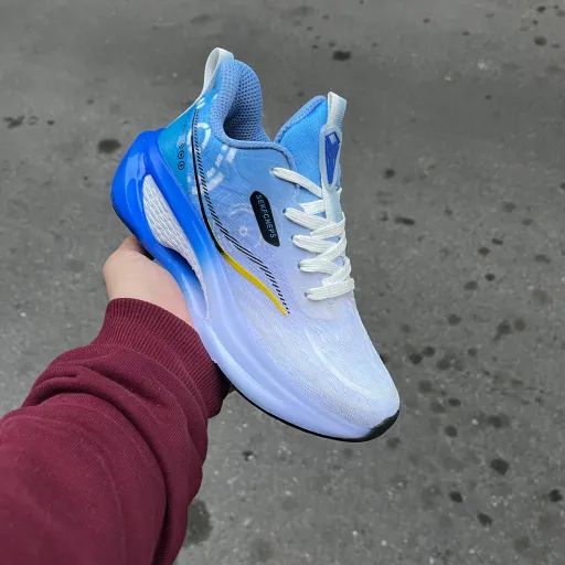 کتونی زنانه و پسرانه و دخترانه مدل ساکونی رنگ سفید آبی SAUCONY SEKFCNEPS سایز 37
