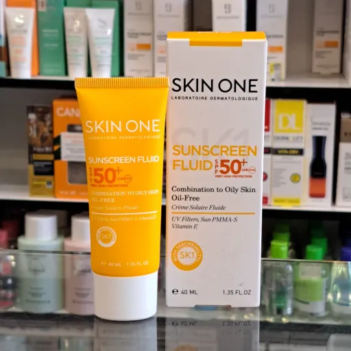 ضدآفتاب بی رنگ پوست چرب و مختلط SPF50 اسکین وان