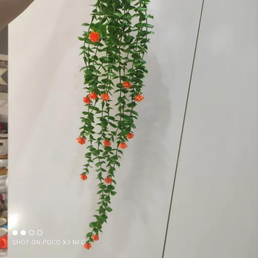 آویزشمشاد سبز گل دار نارنجی خاص و ظریف زیبا