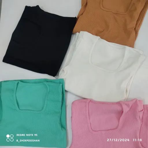 کراپ آستین کوتاه آستین پیله جنس کبریتی کراپ آستین پیله  فری سایز  مناسب از 38 تا 44 کراپ دخترانه کراپ زنانه کراپ کبریتی رنگ سبز آبی