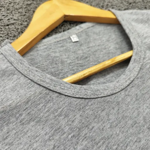 ست تاپ و شلوارک مردانه طرح نایکی جنس نخ پنبه و ملانژ رنگ طوسی سایز 2XL