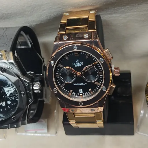 ساعت هابلوت مردانه بند فلزی رزگلد صفحه مشکی Hublot-S