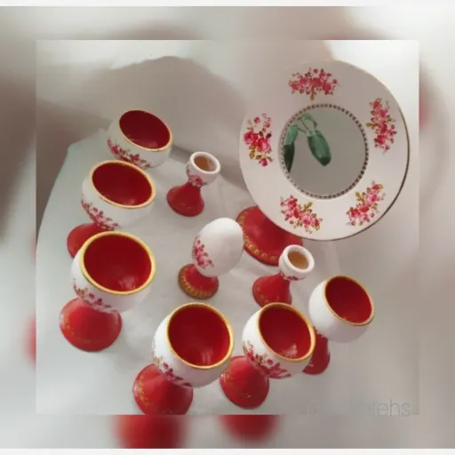 هفتسین سفالی گل سرخی همراه با نقطه کوبی (پس کرایه)