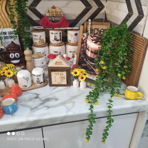 آویز شمشاد سبز گلدار زرد ظریف و زیبا 