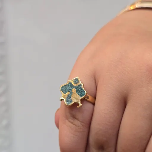 انگشتر فیروزه ای مرغ آمین رنگ ثابت 