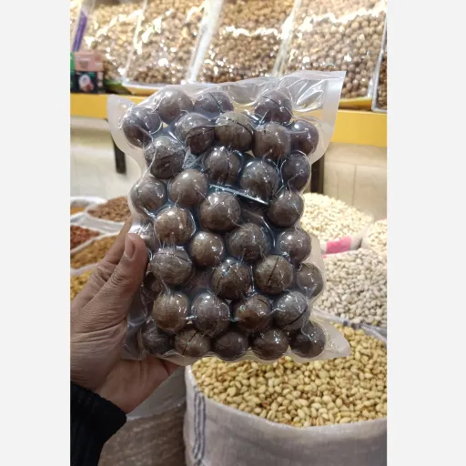 ماکادمیا با پوست طعم وانیل وکیوم 500 گرمی آجیل و خشکبار مهران