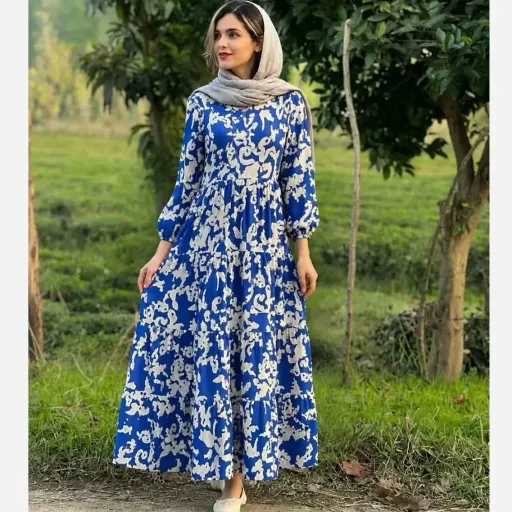 پیراهن زنانه مانتویی فلور طرح ساحلی مدل دامن 3 چین سایز 36 تا 50 رنگبندی مشکی