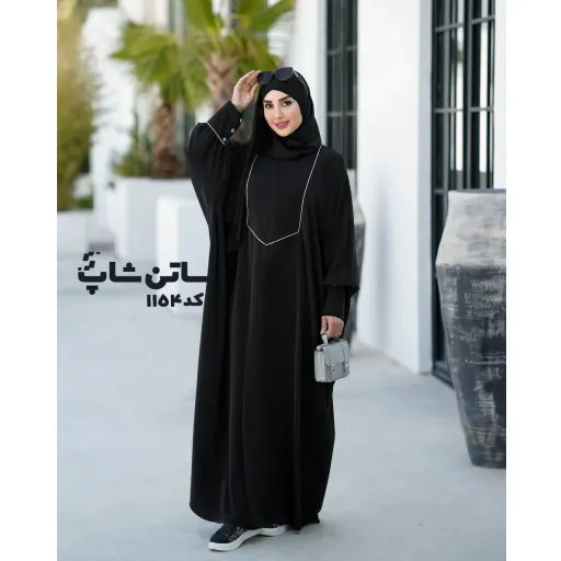 عبا نگار کد: 1154 | برند ساتن شاپ | یقه گرد | رنگ مشکی | رنگ مغزی سفید | قد 140 | جنس کرپ الیزا | سایز سایز 2 | سایز بندی 38-52 | استایل اداری